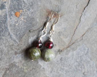 Connemara Marble and garnet earrings , Sterling silver wires, Gift boxed.  Irish Connemara marble - Posted from Ireland - Hand made item.