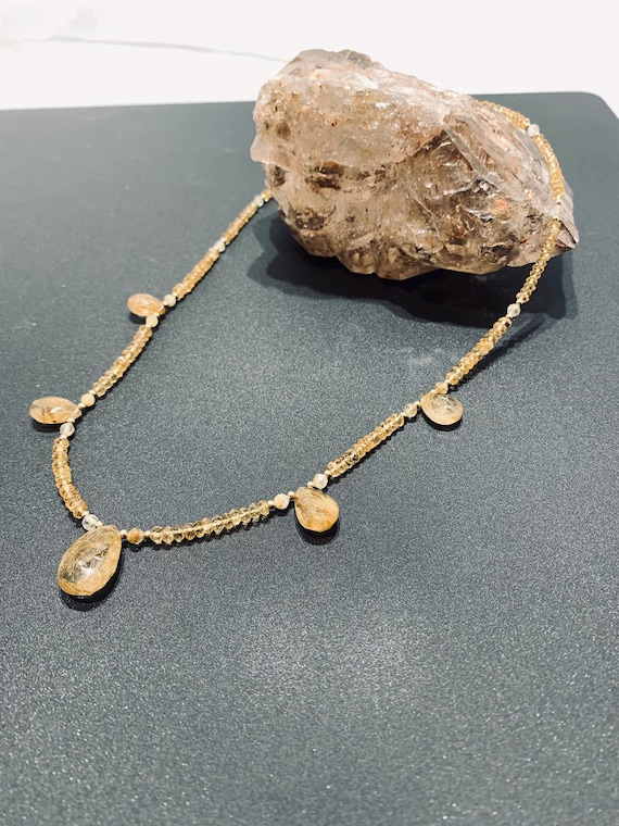 Citrine and Rutile Quartz Facet Cut Rondelle Necklace with Gold Rutile Quartz Facet Cut Briolettes.