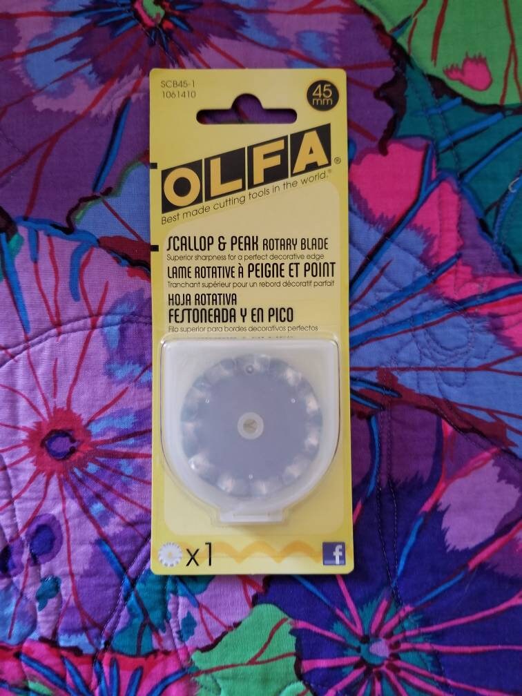 thumbnail interactive-video image 1 of Genuine Olfa 45mm Rotary Cutter Replacement Blades – Tungsten Steel Pinking Wave 1 of 3