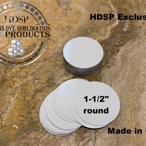 May include: A stack of 1-1/2 inch round white sublimation blanks. The blanks are made in the USA and are exclusive to HDSP, Hawkins Dye Sublimation Products.  Bring your designs to life with sublimation.