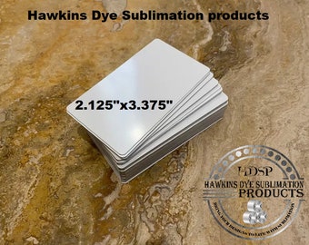 May include: A stack of white rectangular cards, each measuring 2.125" x 3.375", with rounded corners. The cards are blank and ready for dye sublimation. The image includes the text "Hawkins Dye Sublimation products" and a logo.
