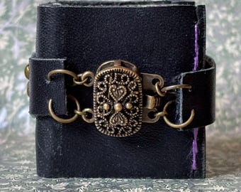 Midnight blue repurposed leather mini book with brass filigree clasp