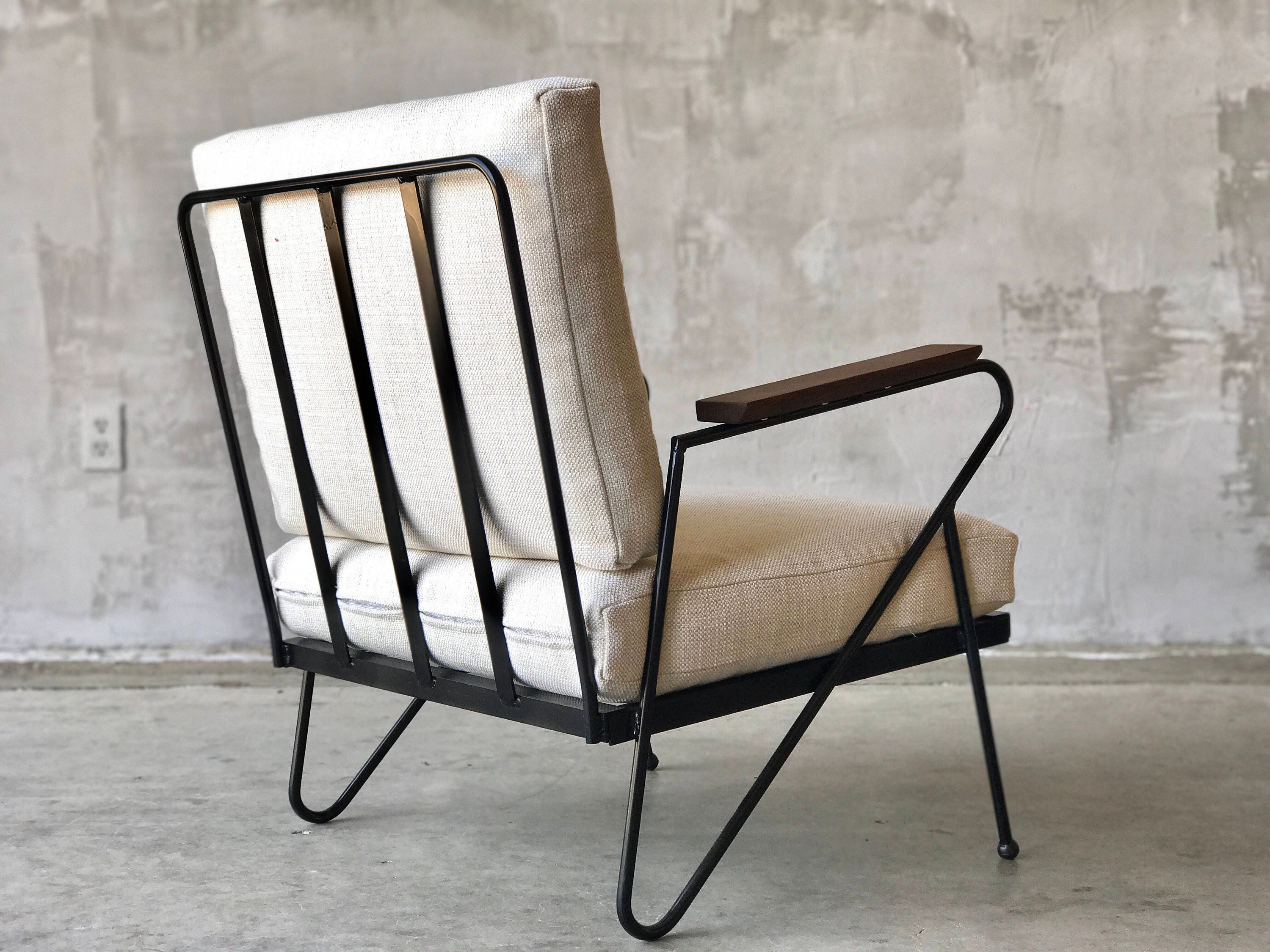 Mid Century style iron lounge chairs.