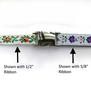 May include: A silver metal buckle with two different floral patterned ribbons. The ribbon on the left is white with green and orange flowers and is shown with 1/2" ribbon. The ribbon on the right is light blue with pink and purple flowers and is shown with 5/8" ribbon.