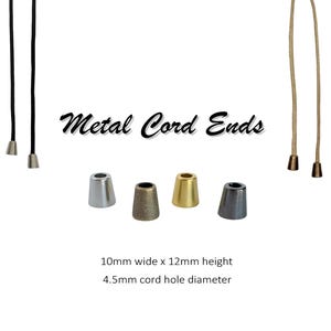 May include: Metal cord ends in silver, gold, and black. The ends are 10mm wide and 12mm high with a 4.5mm cord hole diameter.  "Metal Cord Ends" is written in black cursive.