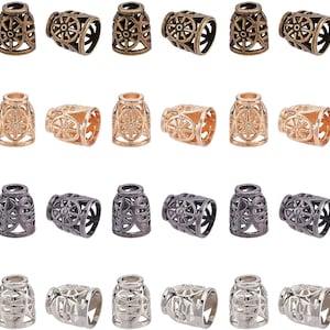 May include: Twenty-four metal cord ends in four different colors: antique brass, gold, gunmetal, and silver. Each end features a decorative, openwork design.