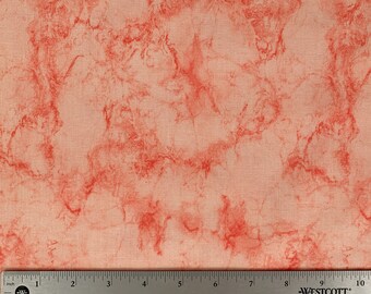 May include: A close-up of a fabric with a light peach background and a red marbled pattern. The fabric has a subtle texture.