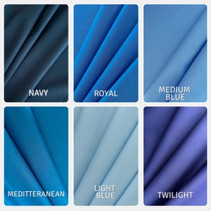 Puede incluir: Una cuadr&iacute;cula de seis muestras de tela en varios tonos de azul. Los colores est&aacute;n etiquetados como Navy, Royal, Medium Blue, Mediterranean, Light Blue y Twilight. Cada muestra presenta pliegues diagonales suaves que crean sombras.