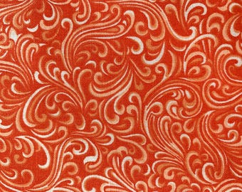 Baumwollstoff mit orangefarbenen Wirbeln, Quiltqualität, lose Ware erhältlich