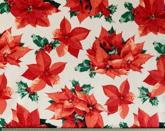 Tela de algodón navideña con estampado de flor de Pascua y acolchado con estampado floral rojo.