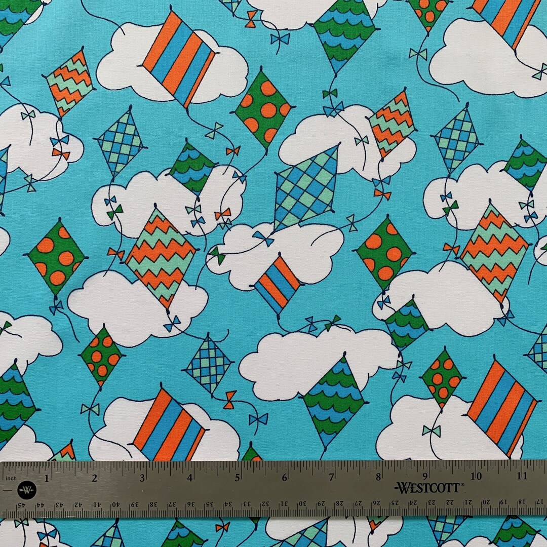 60 Wide Cotton Fabric, Flying Kites on Blue, by Fabric Finders Inc
