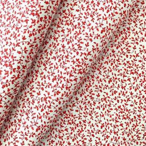 country red calico floral cotton fabric with a white background