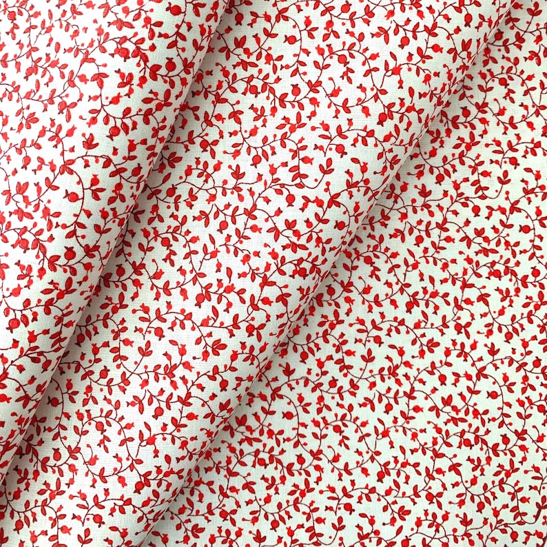 country red calico floral cotton fabric with a white background