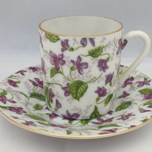 Demitasse espresso cup and saucer with purple and green violets Lefton #2120