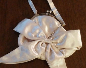 Purse ivory color satin clutch purse with handle, Bijoux Terner brand  with bow and rhinestone