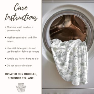 a white washing machine with a floral print towel hanging inside. The text provides care instructions for washing the towel, including using cold water, gentle cycles, mild detergent, and avoiding harsh chemicals.