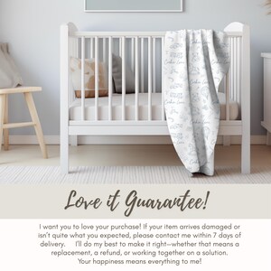 a crib with a blanket on it, placed in a nursery setting.