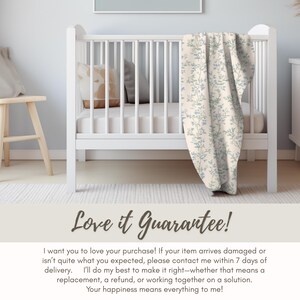 a baby's room with a white crib and blue walls