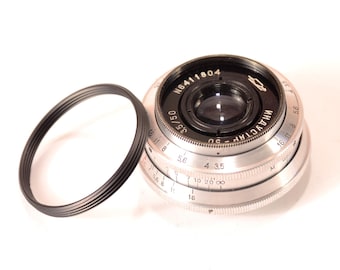 ほぼ新品のブラック Canon FTb QL SLR 35 mm フィルム カメラ +