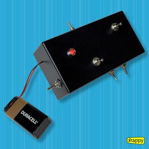 Awkward device | Inconvenient electronic interactive device almost useless but fun plastic box with 9 switches, loud buzzer and LED light