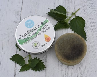 Solid Conditioner Bar in tin by Fizzy Fuzzy. Tea Tree & Nettle. Dry, flaky scalp. Plastic Free. Vegan. Argan Oil, Panthenol.