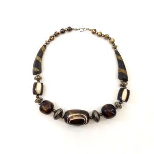 Vintage Hand Carved Bone Necklace: Tribal Amulet Boho Statement Jewelry