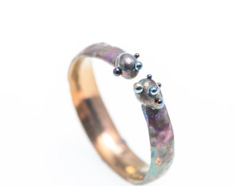 Light, Color and Perception. Pure Titanium Textured Ring. Hypoallergenic. Welding. Anodizing. Made in Finland.