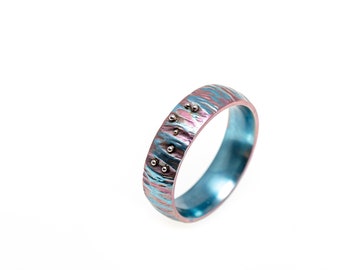 Access Code. Titanium Textured Ring. Hypoallergenic. Welding. Anodizing. Made in Finland.