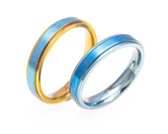 One piece pair of Titanium Engagement Rings - Unity in Diversity - Hypoallergenic Lightweight  Titanium Rings - Design from Finland