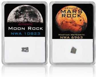 May include: Two small, gray, rectangular rock samples are displayed in clear plastic cases. The case on the left features a black background with a full moon image and the text "AUTHENTIC MOON ROCK NWA 10823". The case on the right features a black background with a red image of Mars and the text "GENUINE MARS ROCK MARTIAN METEORITE NWA 6963".