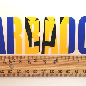 May include: A blue and yellow sticker with the word "BARBADOS" in blue letters and the national flag of Barbados in the center.