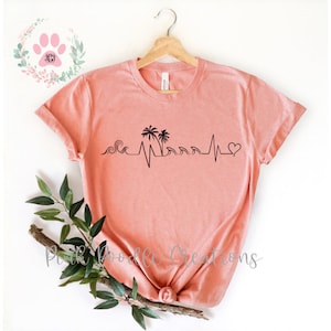 Beach Heartbeat Graphic Tee: Vacation Vibes Shirt for Coastal Getaways and Summer Relaxation