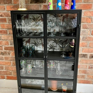 Black metal & glass fronted industrial jungle display cabinet | Glass display cabinet | Lounge storage cabinet |  Metal Drinks cabinet.