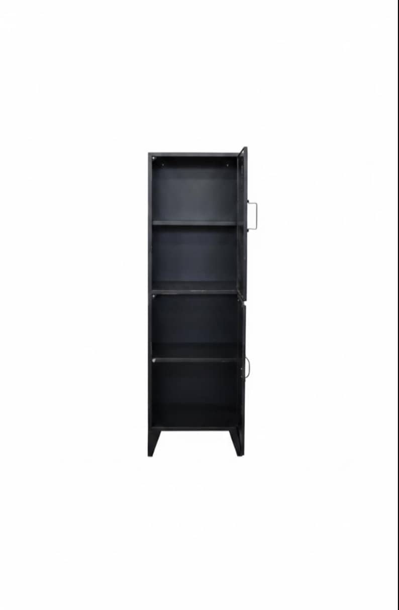 May include: A tall, black metal cabinet with a single door ajar, revealing interior shelves. The cabinet has a rectangular shape with a handle on the door. The shelves are visible inside the cabinet.