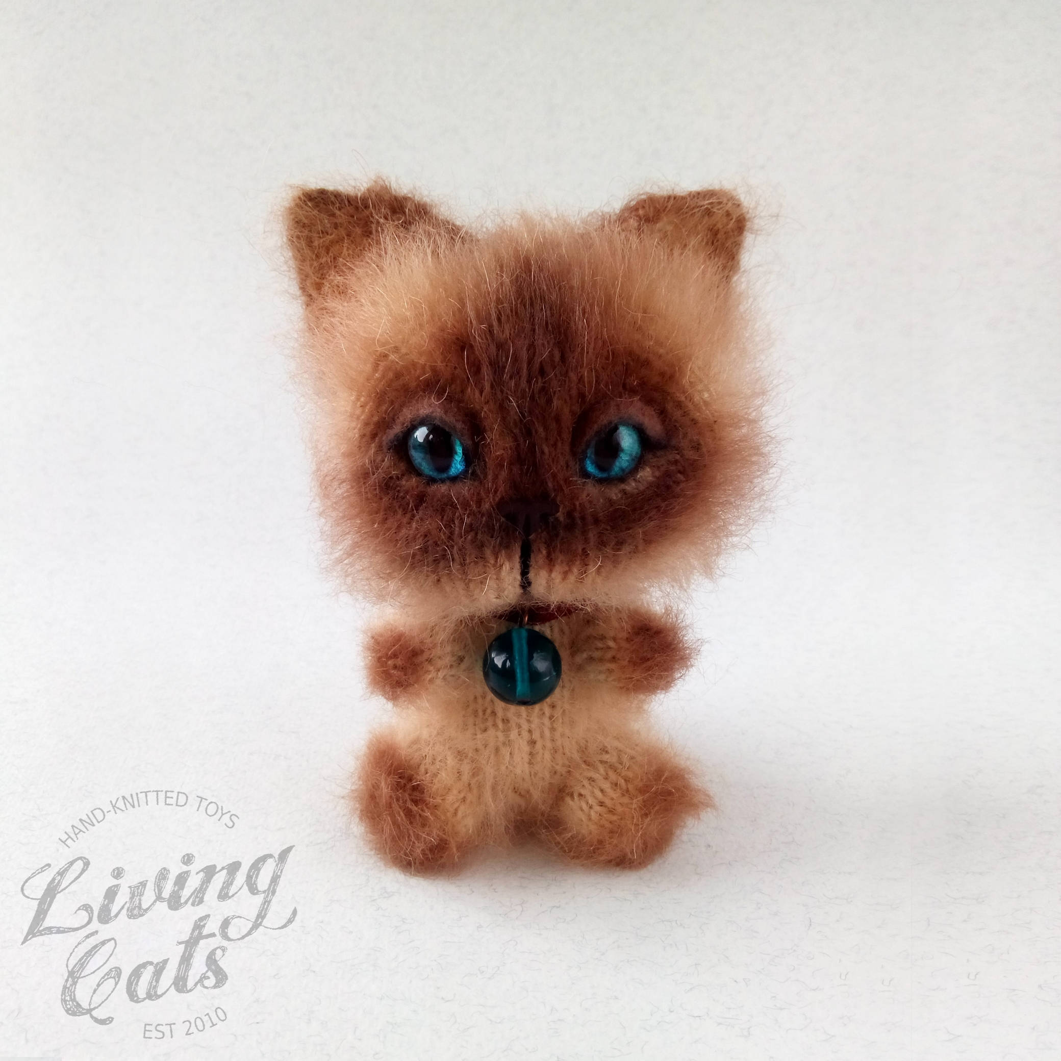 siamese plush cat