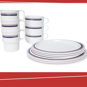 May include: A white dinnerware set featuring mugs and plates. The mugs are stacked and the plates are in a pile. Each piece has a design of blue, red, and brown stripes. The set is on a white background.