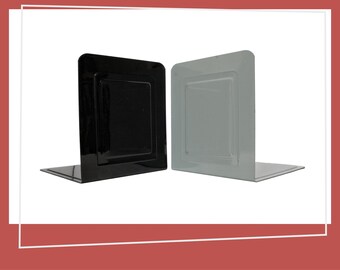 May include: Two bookends, one black and one grey, with a simple, rectangular design. They are made of metal and have a slight curve at the bottom.