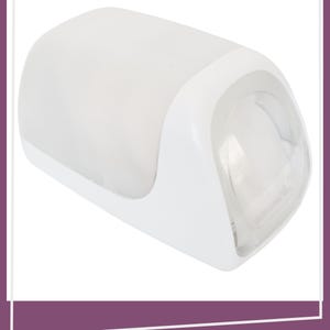 May include: A white wall-mounted light fixture with a curved, semi-cylindrical shape. The main body features a smooth, opaque white finish, while the side panel is made of a clear, transparent material, creating a sleek and functional design.