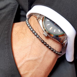Bracciale uomo Ematite e acciaio. Bracciale artigianale pietre ematite. Regali per lui. Regali anniversario. Regali Laurea per lui.