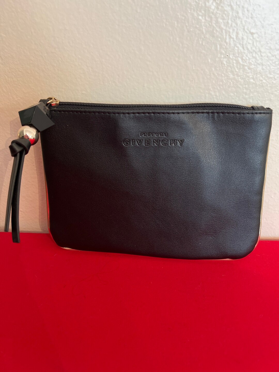 Givenchy parfums black leather clutch 2025