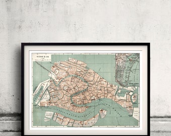 May include: A vintage map of Venice, Italy, in a black frame. The map shows the canals and islands of the city, with labels in Italian. The map is printed on a light green background with brown and red details.
