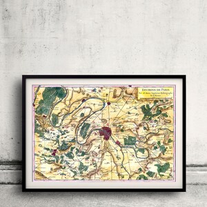 Op de afbeelding: Een antieke kaart van de omgeving van Parijs, Frankrijk. De kaart is gedrukt op papier en ingelijst in zwart. De kaart is getiteld "Environs de Paris" en dateert uit 1780. De kaart toont de stad Parijs in het midden, omringd door de Seine en het omliggende platteland.