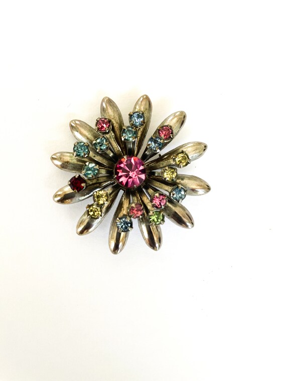 Star brooch in multi colored rhinestones - image 1