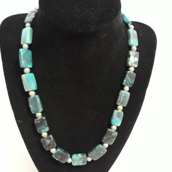 Natural Stone Turquoise and bead necklace with toggle closure. Twenty rectagular stones. 19 inches long. Weight is 2.1 ounces.