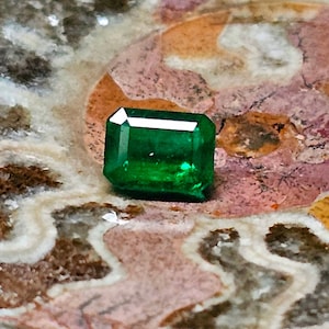 0.89 Carat Natural Emerald Cut Emerald, AGL Report