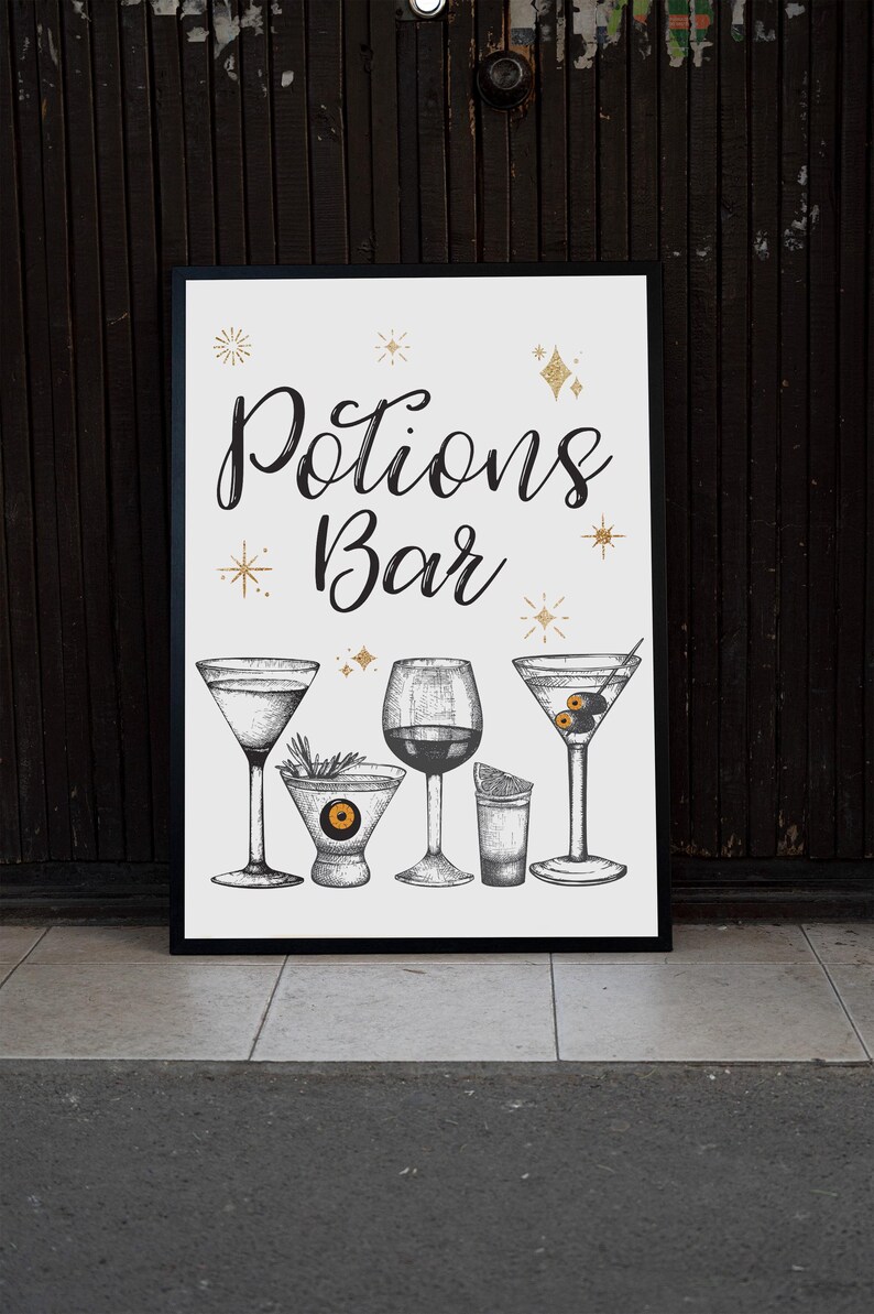 May include: Black framed sign with the words "Potions Bar" in elegant script, accompanied by illustrations of various cocktail glasses. Gold star and diamond accents add a touch of sparkle to the design. The sign is set against a dark wooden background.