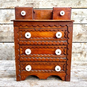 Antique Tramp Art Cabinet: Small Wooden Chest with Porcelain Knobs