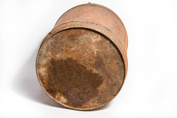 ヴィンテージのVeedol 5ガロンオイル缶：素朴なインダストリアル