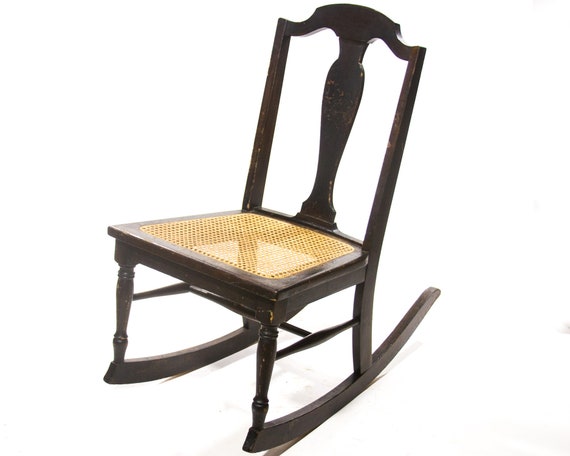 antique childs rocking chair with cane seat