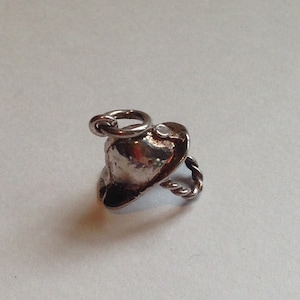Silver firemans helmet charm